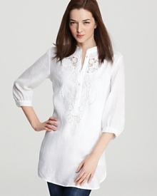 Rendered in a crisp white linen, this BASLER tunic flaunts billowy sleeves and a touch of delicate embroidery, proving that simple really is sweet. Rendered in a crisp white linen, this BASLER tunic flaunts billowy sleeves and a touch of delicate embroidery, proving that simple really is sweet.