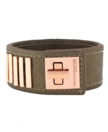 Lock up chic seasonal style! BCBGeneration's trendy turnlock cuff bracelet features neutrals and rosy hues in metallic bronze PVC and rose-gold tone mixed metal. Approximate length: 8-1/2 inches. Lock up chic seasonal style! BCBGeneration's trendy turnlock cuff bracelet features neutrals and rosy hues in metallic bronze PVC and rose-gold tone mixed metal. Approximate length: 8-1/2 inches.