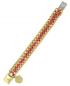 Wrap your wrists in colorful chic. Vince Camuto's chain bracelet flaunts a bright pink cord intertwined in the links. Finished with a pyramid stud magnetic closure. Crafted in gold tone mixed metal. Approximate length: 8 inches.