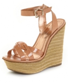 Flowing skirts meet their perfect match with the Frankee wedge sandals from BCBGeneration. A stunning mix of glossy patent and rich leather sit atop an earthy espadrille wedge, for new levels of summer style. Flowing skirts meet their perfect match with the Frankee wedge sandals from BCBGeneration. A stunning mix of glossy patent and rich leather sit atop an earthy espadrille wedge, for new levels of summer style.