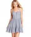 Take the sweet road to sexy style in an a-line halter dress made rich by cute eyelets and a comely neckline! From GUESS?.