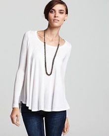 This BCBGMAXAZRIA tee updates the essential basic with a flared bodice and high/low hem for trend-right style any and every season. This BCBGMAXAZRIA tee updates the essential basic with a flared bodice and high/low hem for trend-right style any and every season.