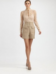 Romantic and feminine, in airy, delicate lace tailored with a tie-front band collar.Band collar with self tieV necklineLong raglan sleeves with button cuffs70% polyamide/30% viscoseDry cleanMade in Italy of imported fabricModel shown is 5'11 (180cm) wearing US size 4. Romantic and feminine, in airy, delicate lace tailored with a tie-front band collar.Band collar with self tieV necklineLong raglan sleeves with button cuffs70% polyamide/30% viscoseDry cleanMade in Italy of imported fabricModel shown is 5'11 (180cm) wearing US size 4.