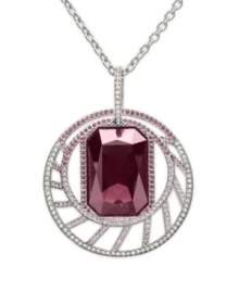 Romancing the stone: Swarovski's circle and stone pendant necklace showcases a faceted crystal in rich red, elegantly encased inside a glittering circle of crystals. Made in silver tone mixed metal. Approximate length: 27 inches. Approximate drop: 1-3/4 inches. Romancing the stone: Swarovski's circle and stone pendant necklace showcases a faceted crystal in rich red, elegantly encased inside a glittering circle of crystals. Made in silver tone mixed metal. Approximate length: 27 inches. Approximate drop: 1-3/4 inches.