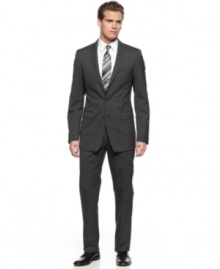 With a sleek slim fit, this pinstriped Calvin Klein suit takes your dress collection into modern territory.