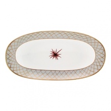 From Bernardaud, jewel-like shapes inspired by the 1940's and an exuberant design imbue this dinnerware pattern with a baroque and precious quality. Etoiles's bold styling offers a new interior aesthetic full of whimsy. From Bernardaud, jewel-like shapes inspired by the 1940's and an exuberant design imbue this dinnerware pattern with a baroque and precious quality. Etoiles's bold styling offers a new interior aesthetic full of whimsy.