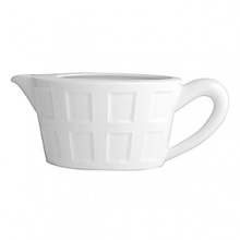Architectural, white Limoges china with subtle relief patterns. Inspired by the coffered ceilings of Renaissance castles, its geometric motif emphasizes the sense of depth and quality of the material. Accessories shown: Beverage server, creamer, sugar, soup bowl. Architectural, white Limoges china with subtle relief patterns. Inspired by the coffered ceilings of Renaissance castles, its geometric motif emphasizes the sense of depth and quality of the material. Accessories shown: Beverage server, creamer, sugar, soup bowl.