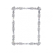 Hand-set Swarovski® crystals add a regal opulence to this brilliant frame. Hand-set Swarovski® crystals add a regal opulence to this brilliant frame.