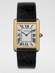 From the Tank Collection. A radiant 18k gold timepiece that combines the past with the present, making it quintessentially Cartier. Quartz movementWater resistant to 3 ATMRectangular 18k gold case, 34.8mm (1.4) X 27.4mm (1)Smooth bezelPale silver opaline dialRoman numeral hour markersAlligator strap with 18k gold buckleMade in Switzerland From the Tank Collection. A radiant 18k gold timepiece that combines the past with the present, making it quintessentially Cartier. Quartz movementWater resistant to 3 ATMRectangular 18k gold case, 34.8mm (1.4) X 27.4mm (1)Smooth bezelPale silver opaline dialRoman numeral hour markersAlligator strap with 18k gold buckleMade in Switzerland