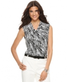 Outfit yourself in this striking tank top from Jones New York, featuring an allover abstract print and chic twist detail at the neckline. It's a brilliant match with white trousers! Outfit yourself in this striking tank top from Jones New York, featuring an allover abstract print and chic twist detail at the neckline. It's a brilliant match with white trousers!