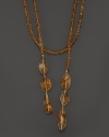 Citrine roundels and nuggets combine with 14K gold to create an elegant lariat necklace.