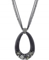 Earthy and eclectic. Kenneth Cole New York's pendant necklace is simultaneously chic and unique. Made in hematite tone mixed metal, it's embellished with an oval-shaped wood pendant and sparkling crystal accents. Approximate length: 30 inches + 3-inch extender. Approximate drop: 2-1/2 inches.