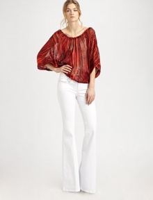 Burnout silk viscose crafted in an airy blouson silhouette with shapely drawstring waist.Drawstring baotneckGathered sleevesElastic drawstring waistAbout 25 from shoulder to hem55% silk/45% rayonDry cleanImportedModel shown is 5'10 (177cm) wearing US size 4. Burnout silk viscose crafted in an airy blouson silhouette with shapely drawstring waist.Drawstring baotneckGathered sleevesElastic drawstring waistAbout 25 from shoulder to hem55% silk/45% rayonDry cleanImportedModel shown is 5'10 (177cm) wearing US size 4.
