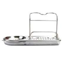 The OXO Stainless Steel Sink Organizer helps keep sink area neat and organized. Slim design fits in tight spaces and won't hog counter space. Features separate areas for long-handled brushes, palm brushes, pump dispensers and a sponge. Perforated base keeps sponges and tools dry; drip tray is removable for cleaning. The OXO Stainless Steel Sink Organizer helps keep sink area neat and organized. Slim design fits in tight spaces and won't hog counter space. Features separate areas for long-handled brushes, palm brushes, pump dispensers and a sponge. Perforated base keeps sponges and tools dry; drip tray is removable for cleaning.