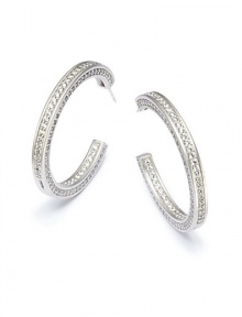 THE LOOKHoop silhouetteInset cubic zirconia accentsSterling silver settingPost backTHE MEASUREMENTLength, about 1.5ORIGINImported THE LOOKHoop silhouetteInset cubic zirconia accentsSterling silver settingPost backTHE MEASUREMENTLength, about 1.5ORIGINImported