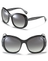 Glam it up in oversized round frame sunglasses from DVF.