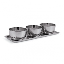 A study in contrasts, the smooth, gleaming edges of the Placid collection offset a gently textured surface - like sand and sea. Uniquely hand-hammered stainless steel gives it contemporary refinement and ease. These pieces are scratch-resistant, don't require polishing and are dishwasher safe. A study in contrasts, the smooth, gleaming edges of the Placid collection offset a gently textured surface - like sand and sea. Uniquely hand-hammered stainless steel gives it contemporary refinement and ease. These pieces are scratch-resistant, don't require polishing and are dishwasher safe.
