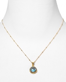 This haute bohemian pendant necklace from Coralia Leets charms with rich texture and hue. The gleaming gold setting sets off a luxe labradorite stone. This haute bohemian pendant necklace from Coralia Leets charms with rich texture and hue. The gleaming gold setting sets off a luxe labradorite stone.