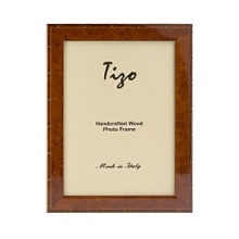 Exquisitely detailed with inlaid marquetry and a high gloss finish, these Italian wood frames offer a perfect way to showcase your pictures. Available in three sizes. Exquisitely detailed with inlaid marquetry and a high gloss finish, these Italian wood frames offer a perfect way to showcase your pictures. Available in three sizes.