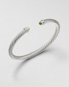 From the Cable Classics Collection. An iconic, sterling silver cable design accented with colorful peridot and sparkling diamonds. PeridotSterling silverDiamonds, .09 tcwDiameter, about 2.25Slip-on styleImported 