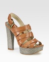 Rich leather straps and an adjustable ankle strap, sweetened by a glitter-encrusted heel and platform. Glitter-coated heel, 5 (125mm)Glitter-coated platform, 1 (25mm)Compares to a 4 heel (100mm)Leather upperLeather liningRubber solePadded insoleImported