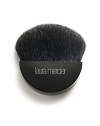 A black goat hair brush with half moon-shaped head and small handle for perfect application of Mineral Primer to quickly maneuver the planes and contours of the face. Pick up Mineral Primer and tap off excess. Apply to the planes of the face and working to the contours. Follow with Mineral Powder or Foundation Powder. 