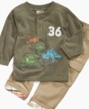 Give a nod to the land before time with this darling dinosaur shirt and cargo pant set from Nannette.
