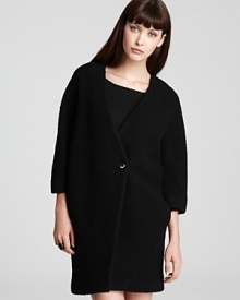 Rock the voluminous trend with this Thakoon Addition coat featuring a fashionable cocoon shape. Rock the voluminous trend with this Thakoon Addition coat featuring a fashionable cocoon shape.