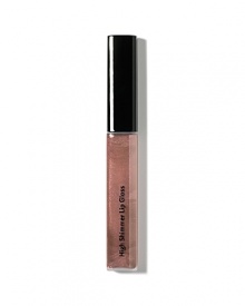 Taking a cue from sunswept skies, we recast our must-have High Shimmer Lip Gloss in two new shades (for that late-in-the-afternoon glow). Combining gorgeous, light-catching shimmer with lasting non-sticky shine, this gloss looks pretty worn alone-and lush over lipstick. Made from fine pearls and clear pigments, as well as a powerhouse mix of vitamins C and E with enriching emollients, so lips feel as good as they look. Featuring a tapered applicator so you can deliver color and shine to lips on-the-go like a pro. Taking a cue from sunswept skies, we recast our must-have High Shimmer Lip Gloss in two new shades (for that late-in-the-afternoon glow). Combining gorgeous, light-catching shimmer with lasting non-sticky shine, this gloss looks pretty worn alone-and lush over lipstick. Made from fine pearls and clear pigments, as well as a powerhouse mix of vitamins C and E with enriching emollients, so lips feel as good as they look. Featuring a tapered applicator so you can deliver color and shine to lips on-the-go like a pro.