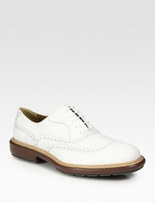 A weekend classic in burnished Italian calfskin, detailed with oxford perforations and a rugged lug sole.Leather liningPadded insoleRubber soleMade in Italy A weekend classic in burnished Italian calfskin, detailed with oxford perforations and a rugged lug sole.Leather liningPadded insoleRubber soleMade in Italy