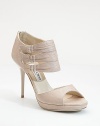 Pleated detail adds an elegant touch to this otherwise edgy leather style.Resin heel, 4¼ (110mm) Self-covered platform, ¾ (20mm) Compares to a 3½ heel (90mm) Open toe Back zipper closure Leather lining and sole Padded insole Made in Italy