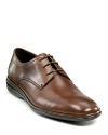 This sophisticated leather lace-up shoe has a clean front and bubble toe for a strong look.