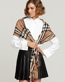 A classic Burberry look a modern twist: wrap yourself in the large proportions of this soft, crinkle-fabric check scarf and transform your look in an instant. A classic Burberry look a modern twist: wrap yourself in the large proportions of this soft, crinkle-fabric check scarf and transform your look in an instant.