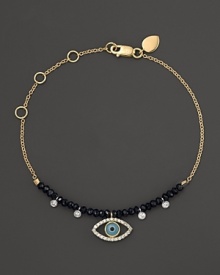 Diamonds and turquoise form a dazzling evil eye on a 14K yellow gold chain. By Meira T. Diamonds and turquoise form a dazzling evil eye on a 14K yellow gold chain. By Meira T.
