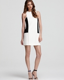 Channel 60s mod in Tibi's color blocked dress, a retro-inspired silhouette with modern appeal. Channel 60s mod in Tibi's color blocked dress, a retro-inspired silhouette with modern appeal.