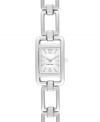 Make a striking connection with this classic design by Nine West. Crafted of silver tone mixed metal linked bracelet and rectangular case. Silver tone dial features applied numerals at twelve and six o'clock, applied stick indices, silver tone three hands and logo at six o'clock. Quartz movement. Limited lifetime warranty.