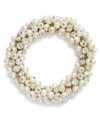 Classic glass pearls in this stretch bracelet from Charter Club help it stand out. Crafted from gold-tone mixed metal, the cluster bracelet makes a subtle, but bold statement. Approximate length: 7 inches. Approximate diameter: 2-1/2 inches.