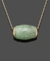 Add uniqueness to your look in this carefully-crafted pendant. Carved from solid jade (10 mm x 15 mm) in pale green hues, this barrel-shaped pendant hangs from a 14k gold setting and chain. Approximate length: 18 inches. Approximate drop: 1/2 inch.