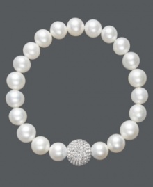 A traditional design receives a sparkling touch. Cultured freshwater pearls (8-9 mm) in shimmery white hues adorn this chic stretch bracelet, while a clear crystal fireball adds extra glamour. Approximate diameter: 3-1/2 inches. A traditional design receives a sparkling touch. Cultured freshwater pearls (8-9 mm) in shimmery white hues adorn this chic stretch bracelet, while a clear crystal fireball adds extra glamour. Approximate diameter: 3-1/2 inches.