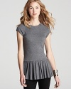 Keep fall light with this whimsical Rebecca Taylor top, flaunting a peplum for the prettiest of accents.