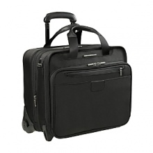 This expandable Briggs & Riley rolling briefcase boasts three sections: an organizer section, a removable sleeve that fits most 15.4 laptops and a file section that accommodates letter and legal size folders. Laptop sleeve can be tethered to the bag at security screenings reducing risk of damage or loss. Front organizer has multiple pockets, including padded pockets for gadgets. Interlocking handle system allows for multiple bag stacking. This expandable Briggs & Riley rolling briefcase boasts three sections: an organizer section, a removable sleeve that fits most 15.4 laptops and a file section that accommodates letter and legal size folders. Laptop sleeve can be tethered to the bag at security screenings reducing risk of damage or loss. Front organizer has multiple pockets, including padded pockets for gadgets. Interlocking handle system allows for multiple bag stacking.