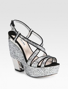 Glitter and suede trimmed slingback with a lustrous metal heel and an adjustable ankle strap. Metal-covered heel, 5½ (140mm)Glitter platform, 1½ (40mm)Compares to a 4 heel (100mm)Glitter and suede upperLeather and suede liningLeather solePadded insoleImportedOUR FIT MODEL RECOMMENDS ordering one half size up as this style runs small. Glitter and suede trimmed slingback with a lustrous metal heel and an adjustable ankle strap. Metal-covered heel, 5½ (140mm)Glitter platform, 1½ (40mm)Compares to a 4 heel (100mm)Glitter and suede upperLeather and suede liningLeather solePadded insoleImportedOUR FIT MODEL RECOMMENDS ordering one half size up as this style runs small.