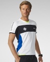 The ultimate performance tee is rendered in breathable moisture-wicking Coolmax® microfiber with bold neon piecing and reflective details -- a must-have for nighttime visibility. Coolmax® technology moves perspiration away from the body and through the fabric for superior cooling and ventilating capabilities.