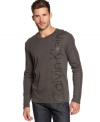 To layer or not to layer? This great looking v-neck shirt by Calvin Klein is attractive to be worn alone or as an added layer.