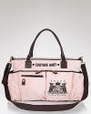 Keep all those new mom essentials safely and stylishly stowed inside Juicy Couture's girlish baby bag.