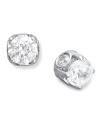 Diamonds with a little extra dazzle. These sweetly-sparkling stud earrings not only feature a round-cut diamond at center, but each pair has a bezel-set diamond in the side as well (total 1 ct. t.w.). Set in 14k white gold with a post backing. Approximate diameter: 4-9/10 mm.