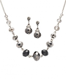 Calm, cool and collected. c.A.K.e. by Ali Khan's shimmery styles feature a faceted jet and silver glass beaded necklace and matching pair of drop earrings. Set in silver tone mixed metal. Approximate length: 16 inches + 2-inch extender. Approximate drop: 1-1/2 inches. Approximate earring drop: 3/4 inch. Calm, cool and collected. c.A.K.e. by Ali Khan's shimmery styles feature a faceted jet and silver glass beaded necklace and matching pair of drop earrings. Set in silver tone mixed metal. Approximate length: 16 inches + 2-inch extender. Approximate drop: 1-1/2 inches. Approximate earring drop: 3/4 inch.