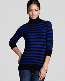 Bundle up with effortless chic in this C by Bloomingdale's striped sweater rendered in plush cashmere. Bundle up with effortless chic in this C by Bloomingdale's striped sweater rendered in plush cashmere.