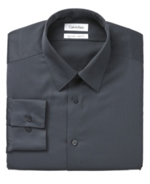 Versatility and dependability. That's what this smart, slim-fitting dress shirt from Calvin Klein offers. Constructed with non-iron fabric and finished with flawless attention to detail, you can't go wrong with this stylish button-down. Versatility and dependability. That's what this smart, slim-fitting dress shirt from Calvin Klein offers. Constructed with non-iron fabric and finished with flawless attention to detail, you can't go wrong with this stylish button-down.