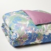 An abstract print in pretty pastels lends modern style to this duvet cover from Edmond Frette.